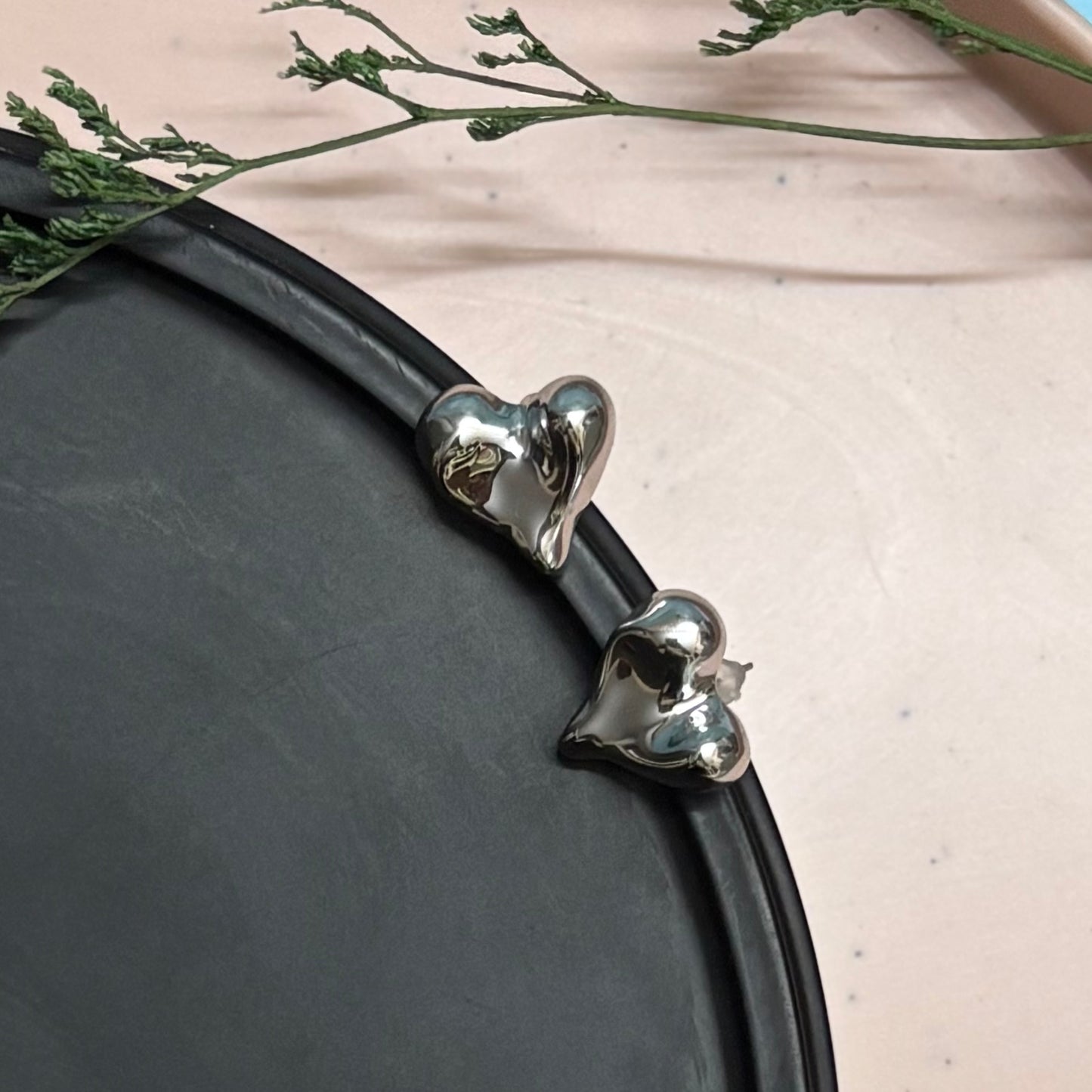 melted hear silver suds earrings buy