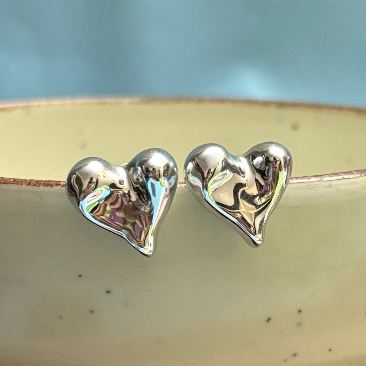 melted hear silver suds earrings buy online for girls